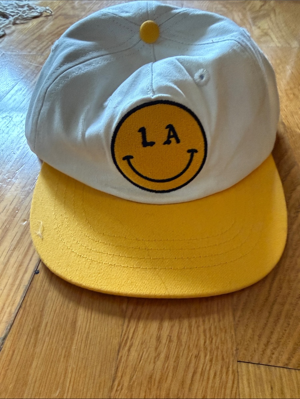 White Cap with Yellow Brim and Smiley Patch by Free & Easy